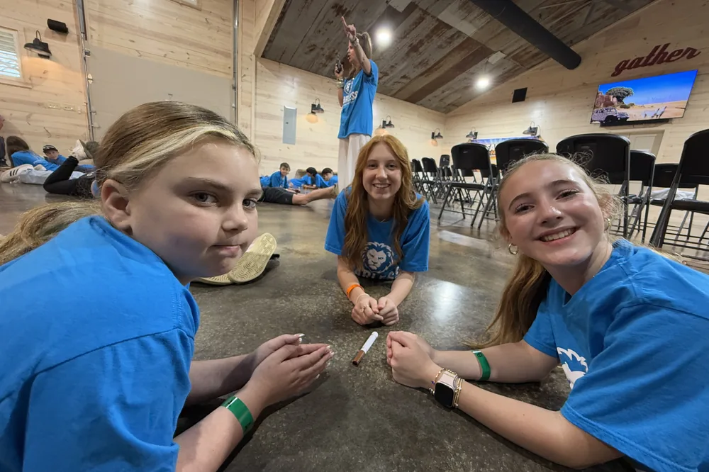Three students together during a Summer Youth Series activity